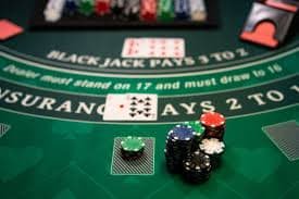 tebing Microgaming live baccarat table with professional dealer in formal attire broadcasting from studio